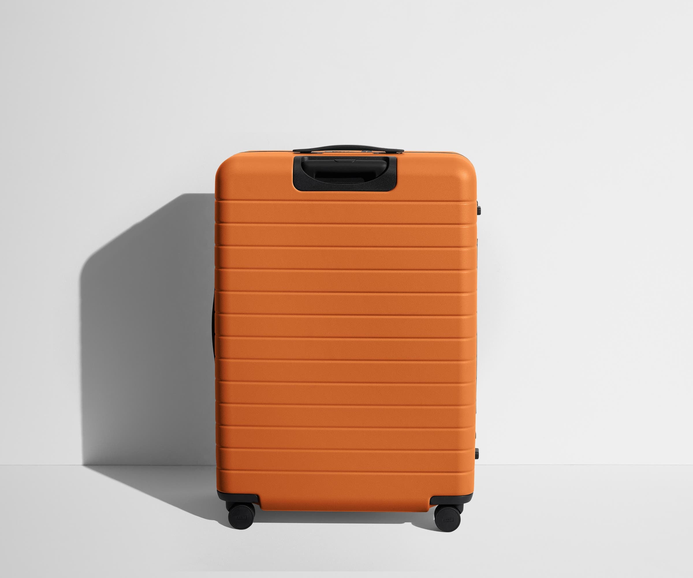 Back product view of The Large suitcase in Sorbet Orange