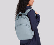 Person wearing the Featherlight Backpack on one shoulder