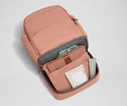 Bottom compartment shown with the included changing pad and Carry-All pouch that fits diapers and wipes