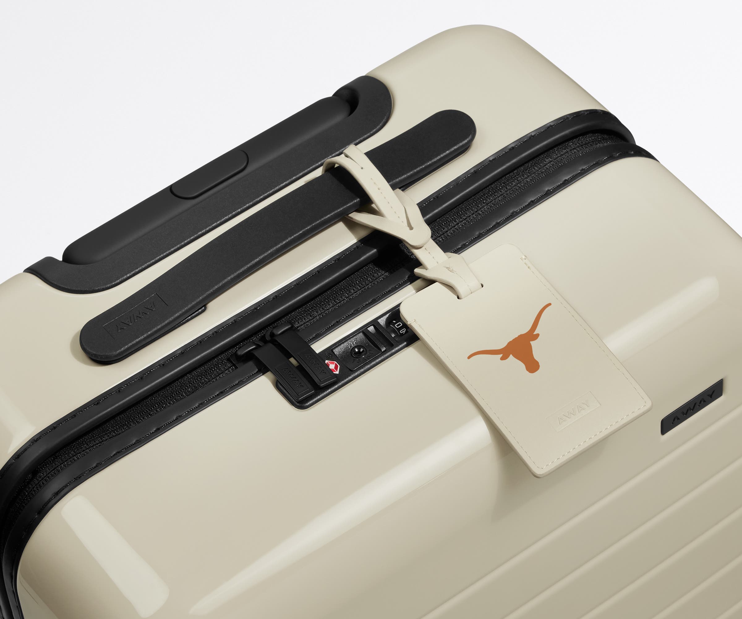 The University of Texas Collegiate Luggage Tag on a matching The University of Texas suitcase