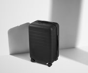 Angled product view of The Carry-On suitcase in Jet Black