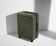 Angled product view of The Medium suitcase in Olive Green