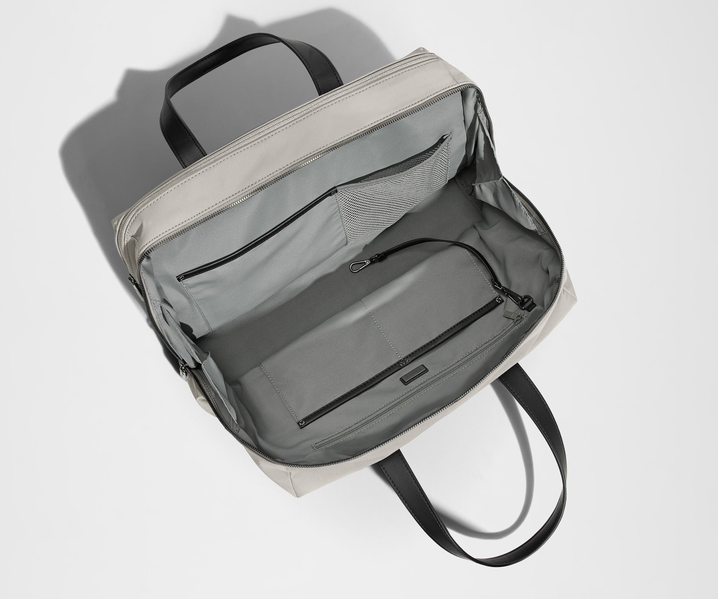 Empty Everywhere Bag, showing the interior organization with multiple slip pockets, zippered pocket, and key leash