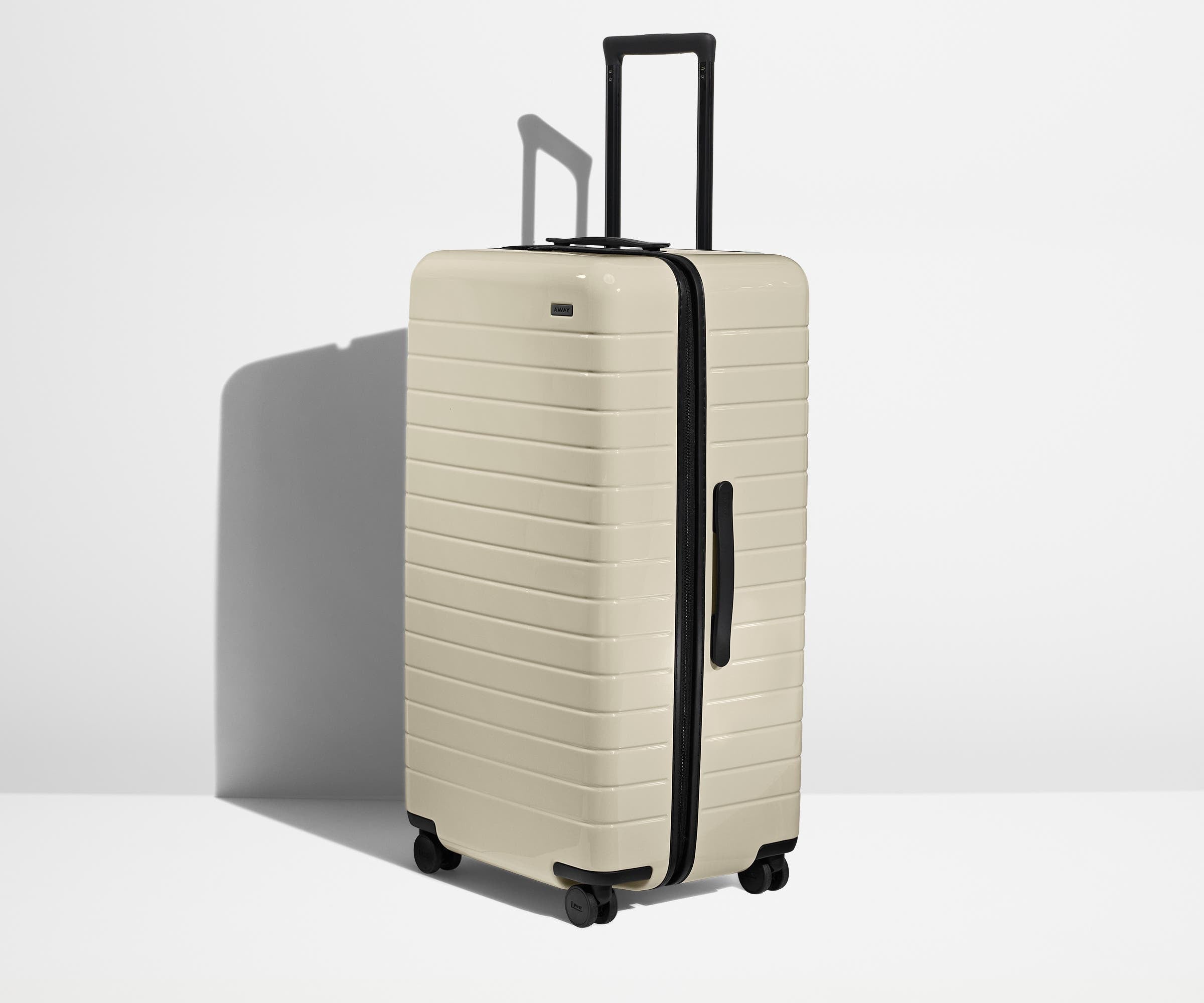 Angled product view of The Trunk suitcase in Salt White (Gloss)