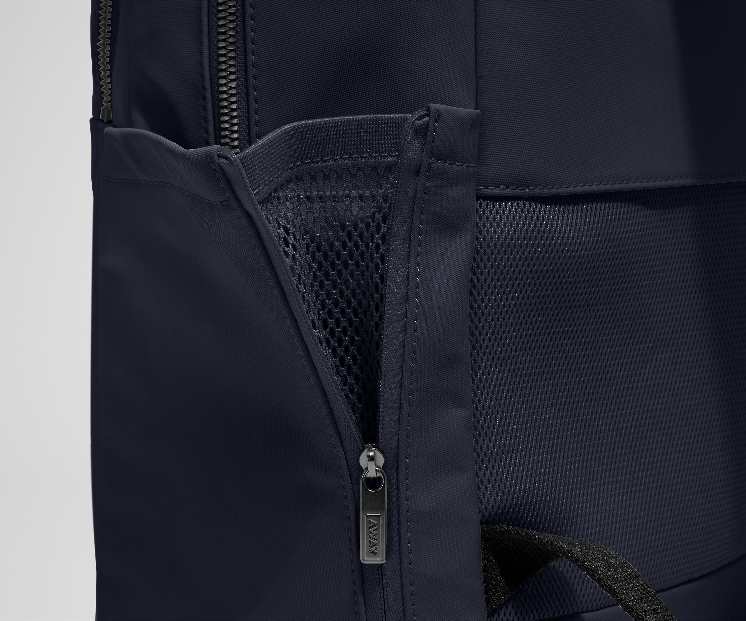 Close up view of the nylon material and exterior water bottle pocket