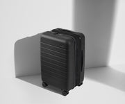 Angled product view of The Carry-On Flex suitcase in Jet Black