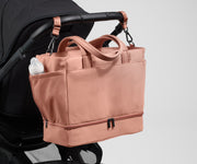 Tote attached to a stroller using the included stroller clips