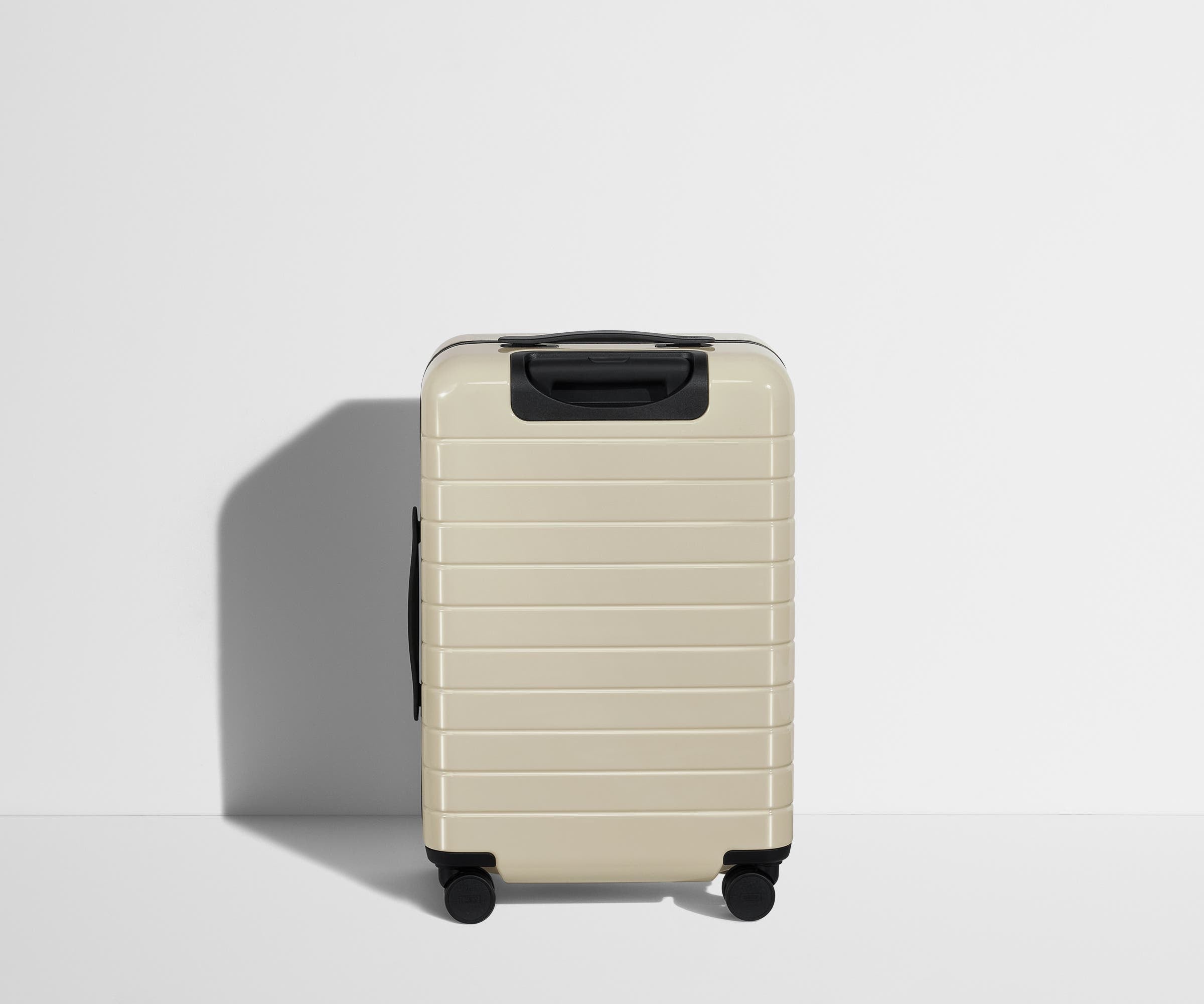 Back product view of The Bigger Carry-On suitcase in Salt White (Gloss)