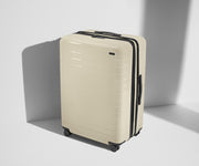 Angled product view of The Large Flex suitcase in Salt White (Gloss)