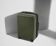 Angled product view of The Medium Flex suitcase in Sea Green