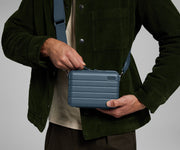 Person wearing The Mini Crossbody in Translucent Green