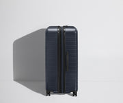 Side product view of The Large Flex suitcase shown fully expanded
