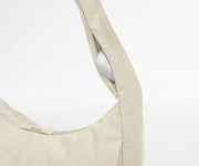 Earpods case packed in the discreet, zippered strap pocket