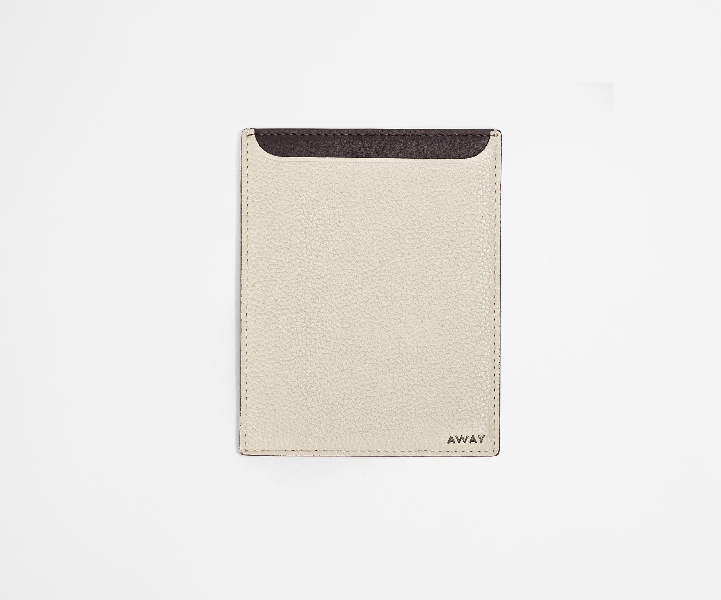 Front view of the passport wallet with a contrasting interior color