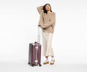 The Aluminum Edge Bigger Carry-On in Oxblood Red