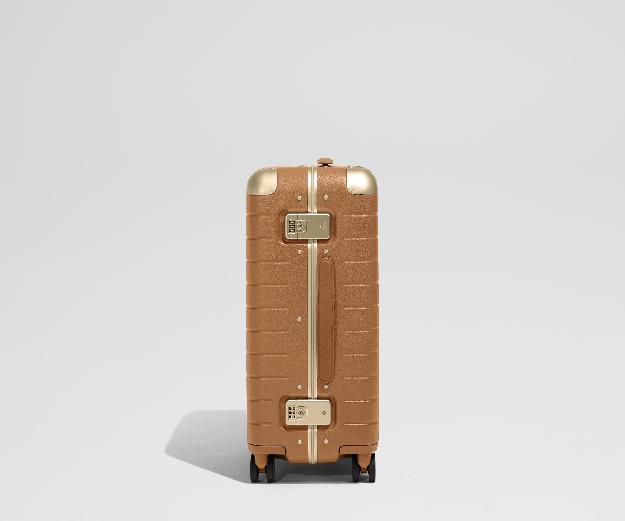 The Aluminum Edge Bigger Carry-On in Cognac Brown