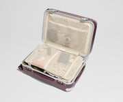 The Aluminum Edge Bigger Carry-On in Oxblood Red