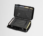 Packed view of an Aluminum Bigger Carry-On, showing the compression pad and interior organization