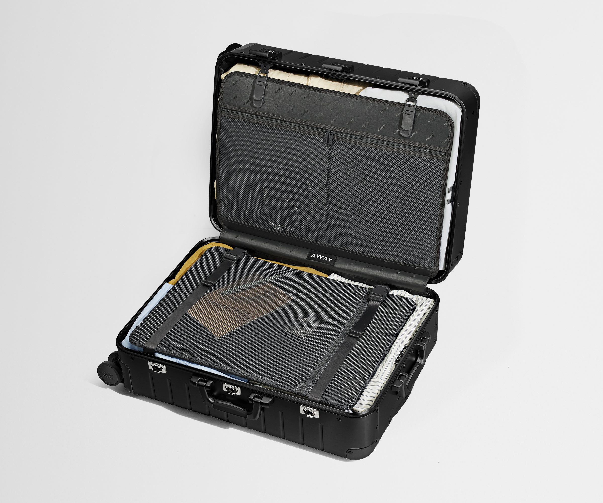 Compression pad and interior organization system of the Medium: Aluminum Edition in Onyx Black