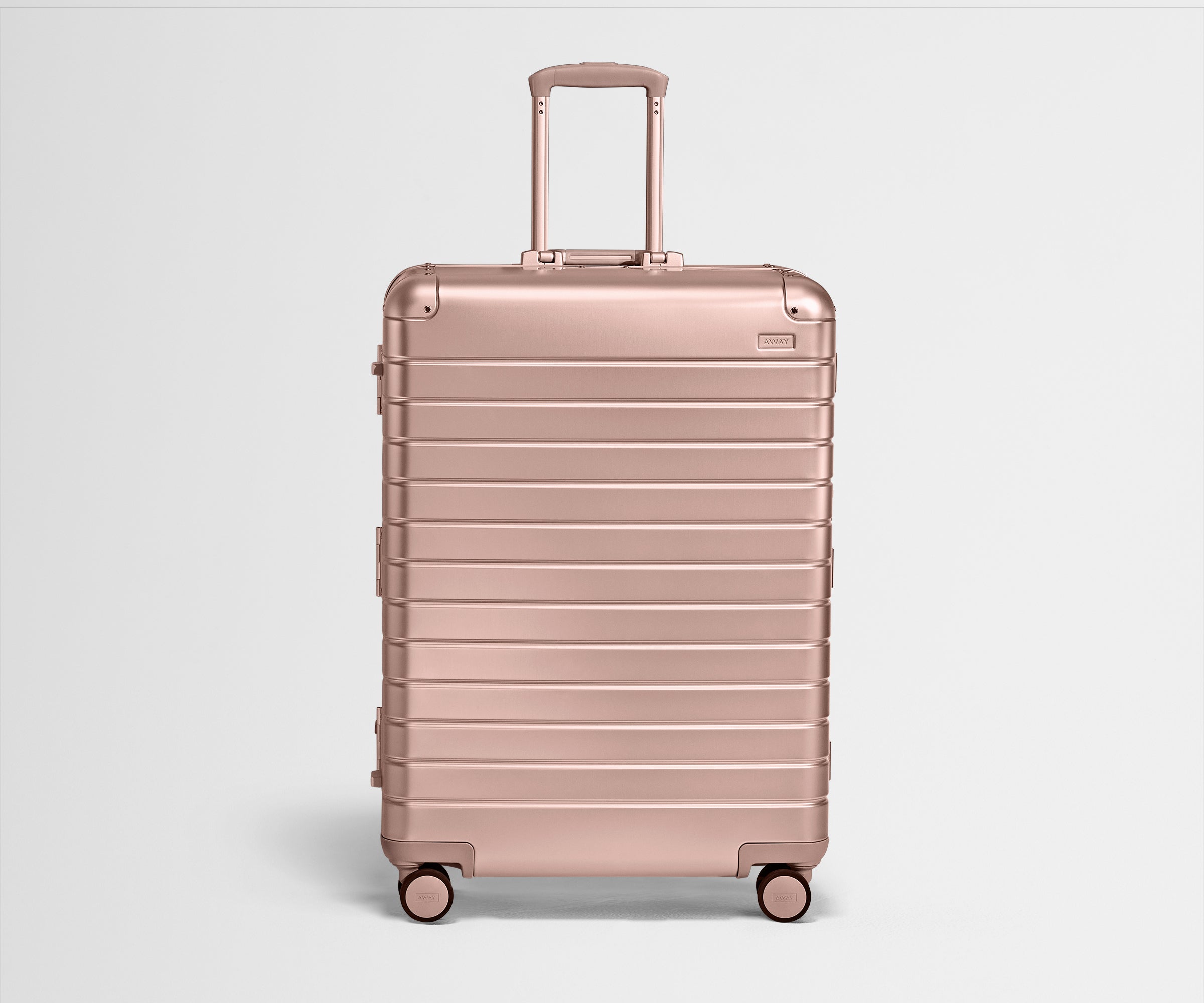 Front view of Large: Aluminum Edition luggage with handles raised
