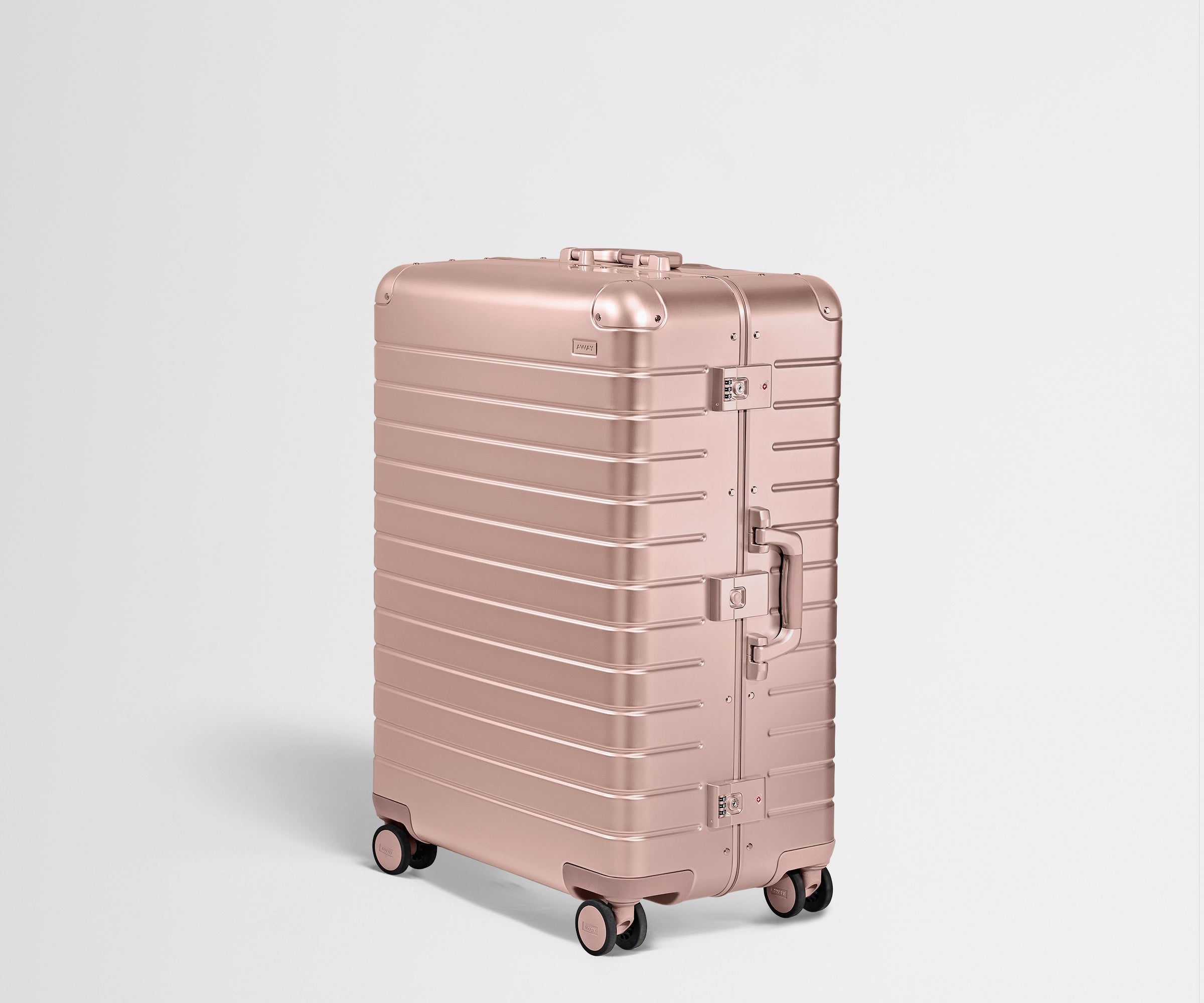 Angled product view of a Rose Gold Large aluminum suitcase