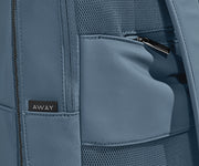 Close up view of the trolley sleeve and hidden back pocket