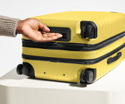 The Bigger Carry-On Flex in Sunshine Yellow