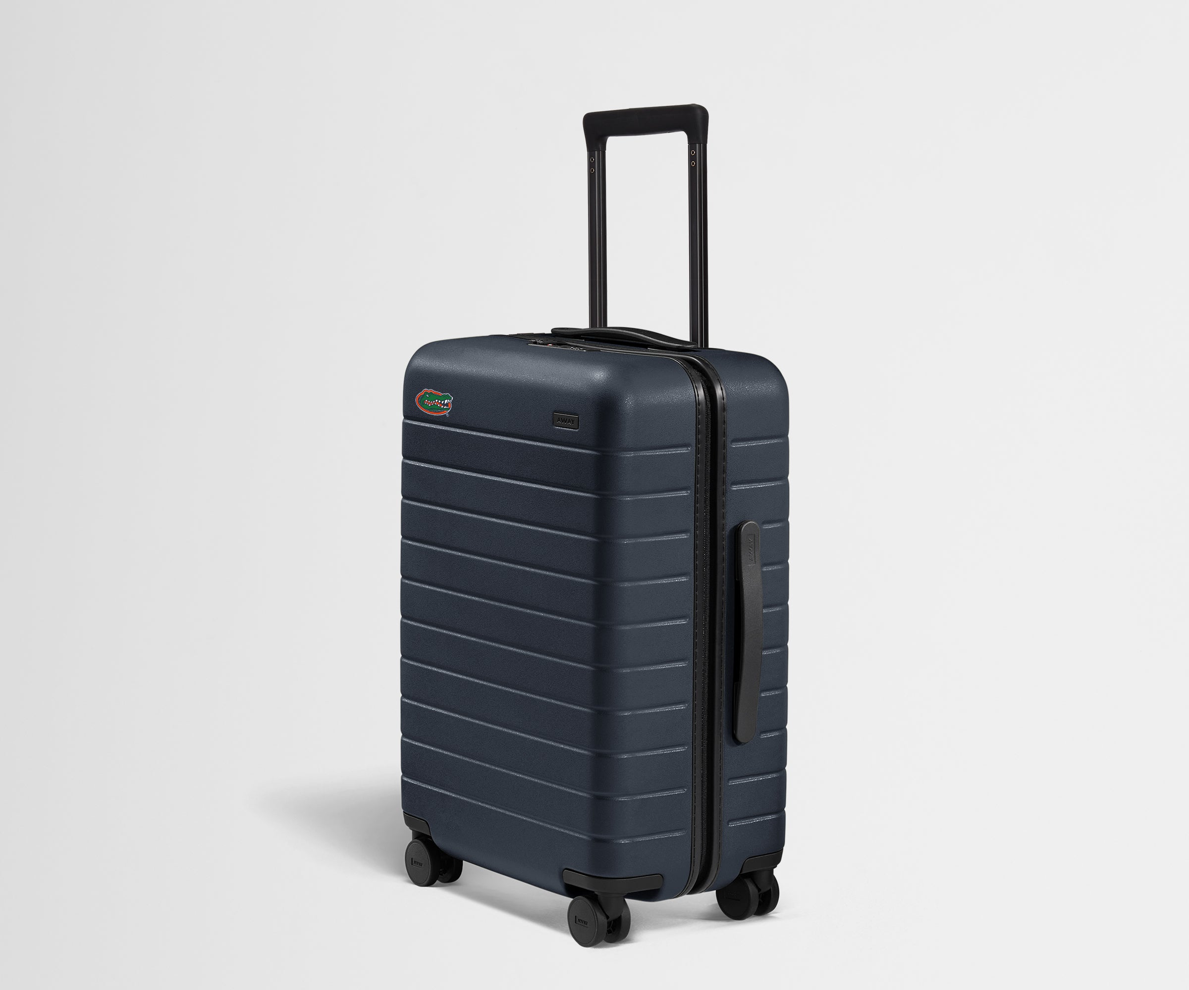Dark blue suitcase with a handle and wheels on a light gray background