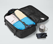 Active Convertible Backpack 45L packed with clothing, a camera, travel mug, and binoculars