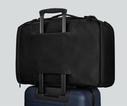 Active Convertible Backpack 45L secured to an Away suitcase by the luggage trolley sleeve