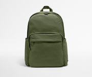 Green backpack on a light gray background