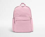 Pink backpack on a light gray background