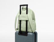 Large Featherlight Backpack on top of an Away suitcase