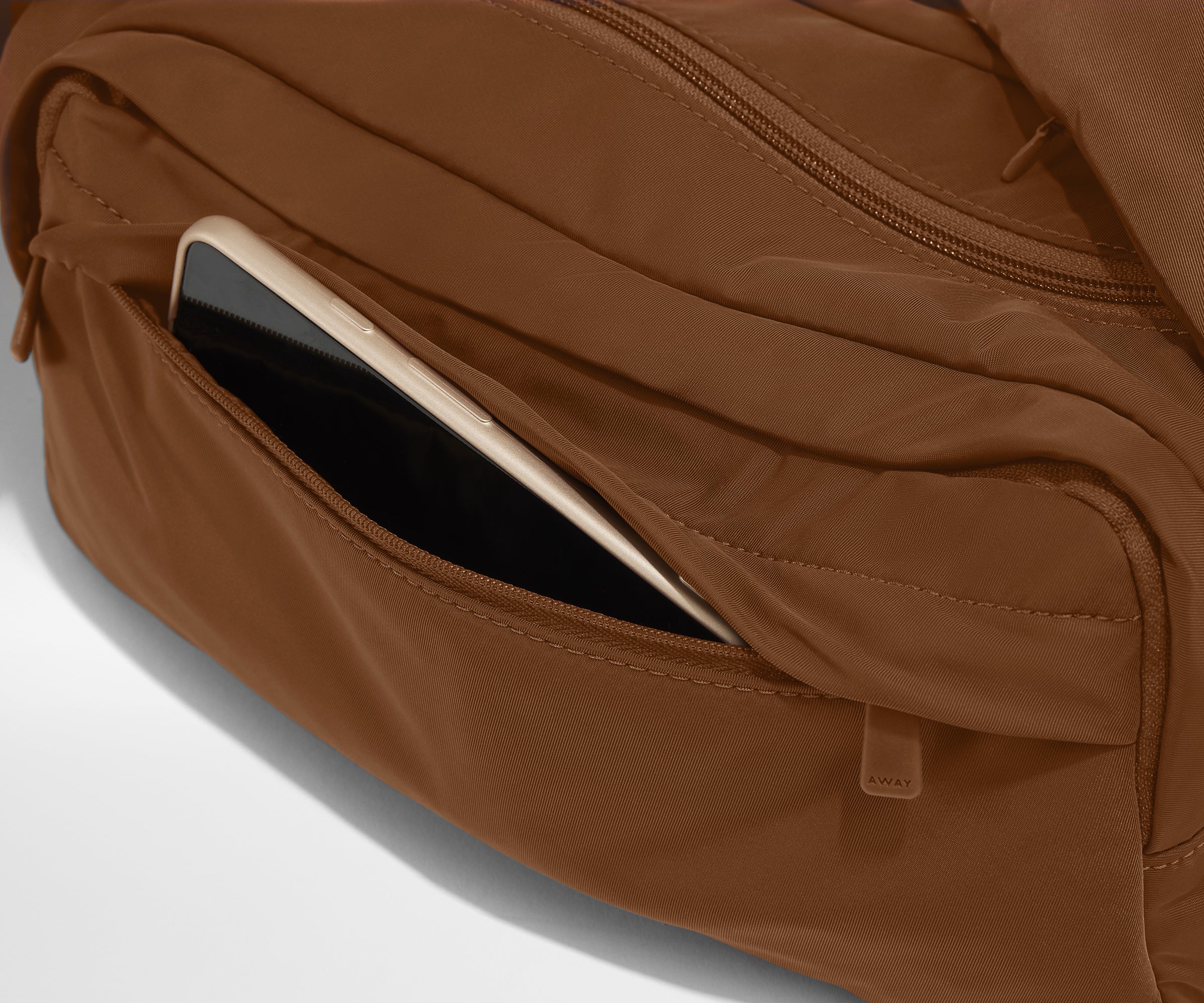 Phone packed in the front zip pocket