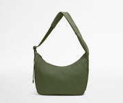 Green shoulder bag on a light gray background