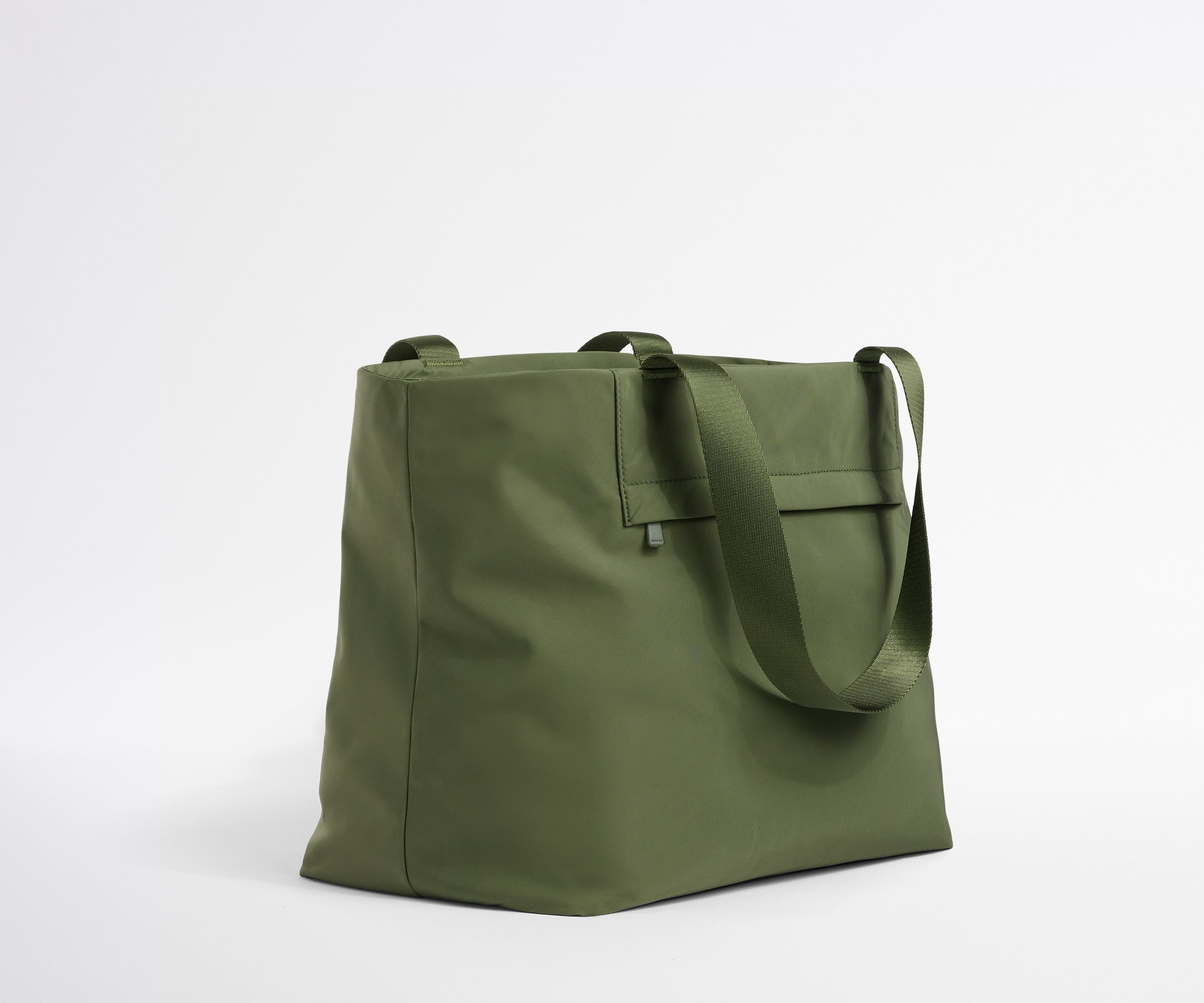 Green tote bag on a white background