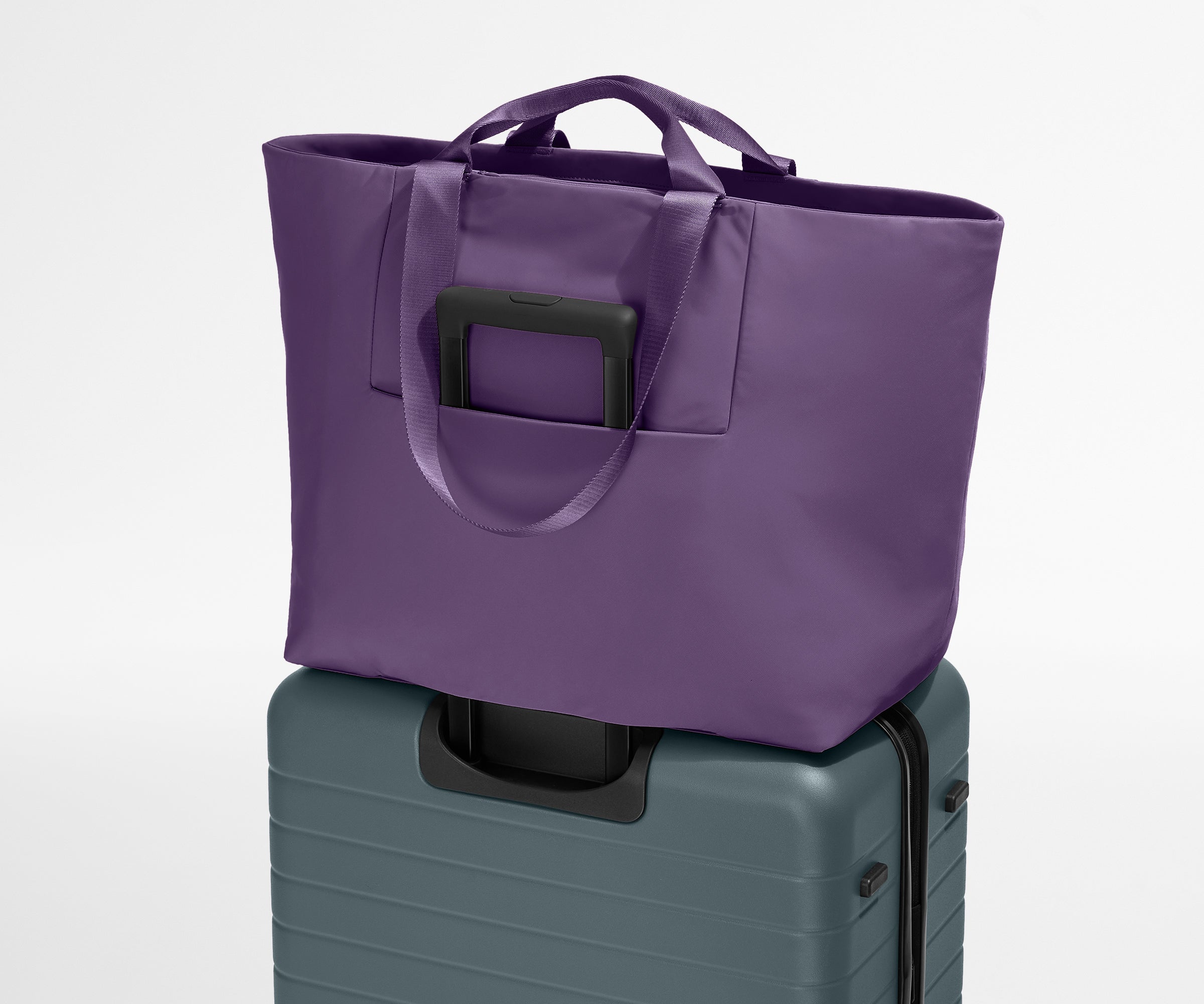 Person holding a Large Featherlight Tote in Arctic Blue