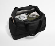 Featherlight Weekender packed with clothes, laptop, camera, and other travel essentials