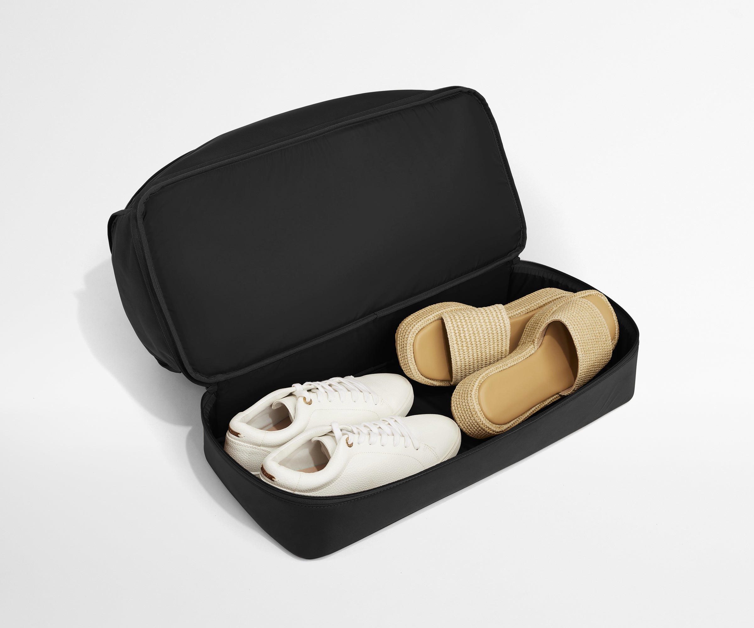 Two pair of shoes in the separate bottom shoe compartment