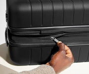 Hand unzipping the wraparound expansion feature