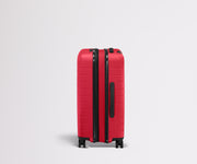 The Bigger Carry-On Flex in Cherry Red