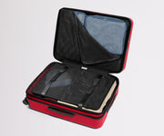 Red suitcase with open lid showing black interior