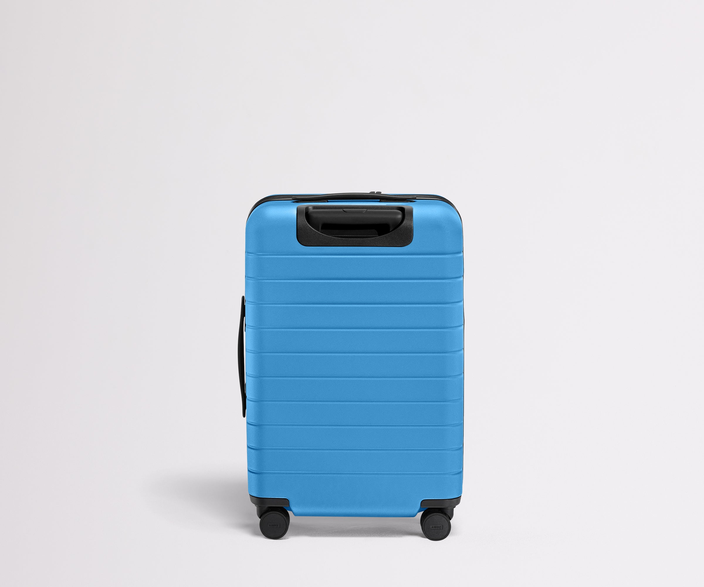 Back product view of The Bigger Carry-On Flex suitcase in Splash Blue