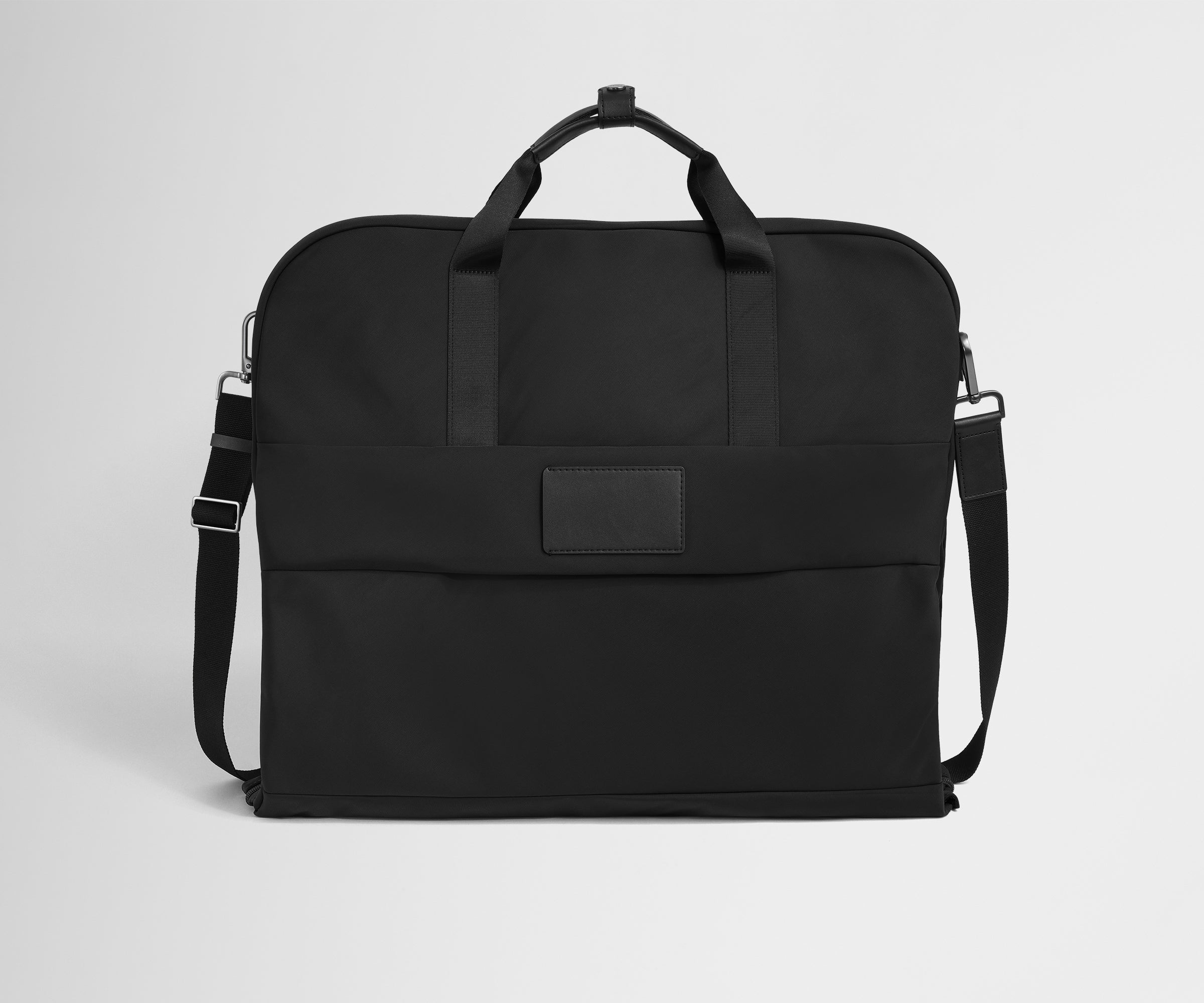 Back product view of the Garment Bag in Jet Black with adjustable, removable shoulder strap attached