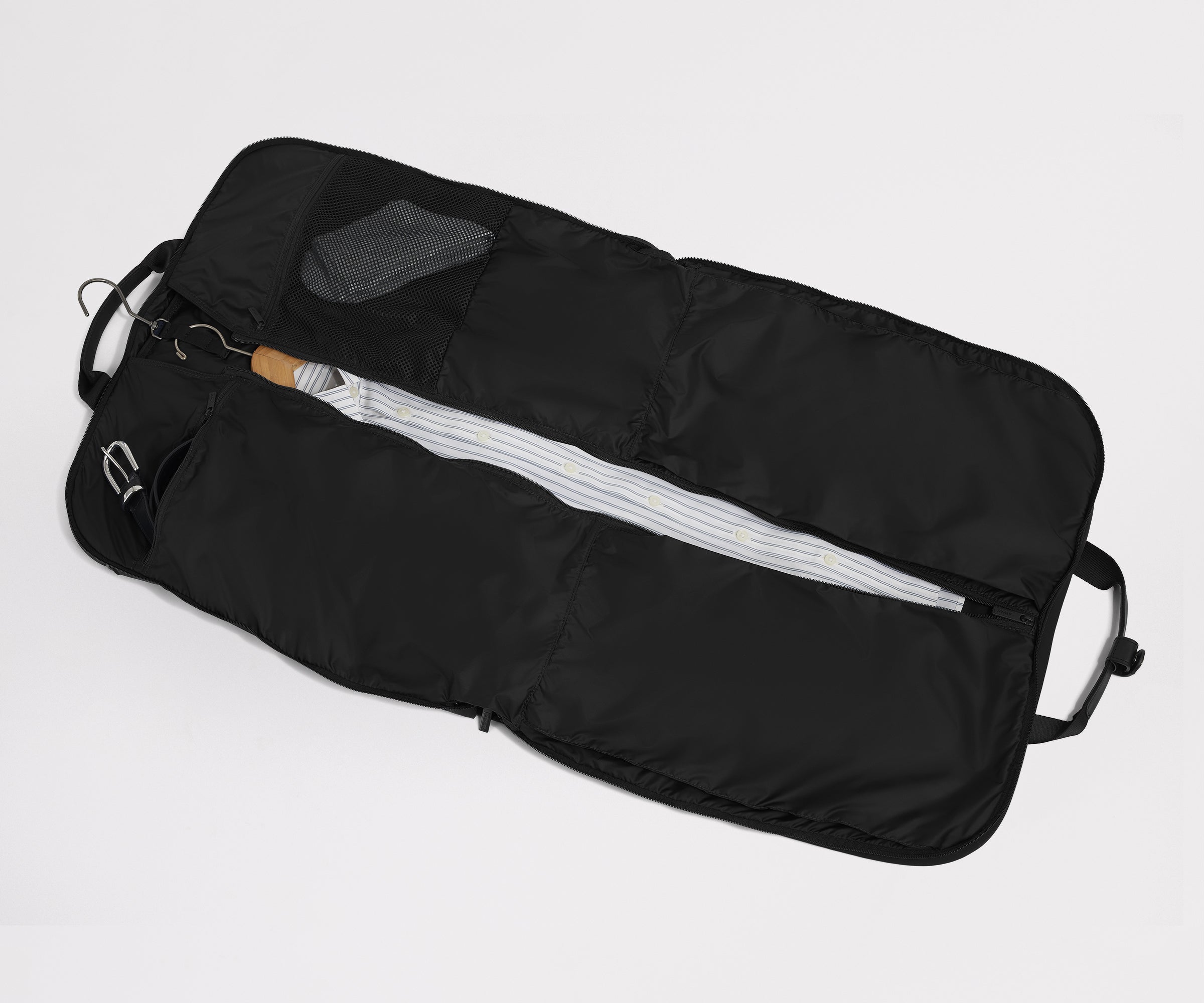 Garment Bag in Jet Black fully unzipped and packed to show capacity and features