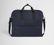 Back product view of the Garment Bag in Navy Blue with adjustable, removable shoulder strap attached