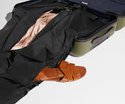 Sandals shown in the zippered side pocket