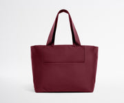Maroon tote bag on a light gray background
