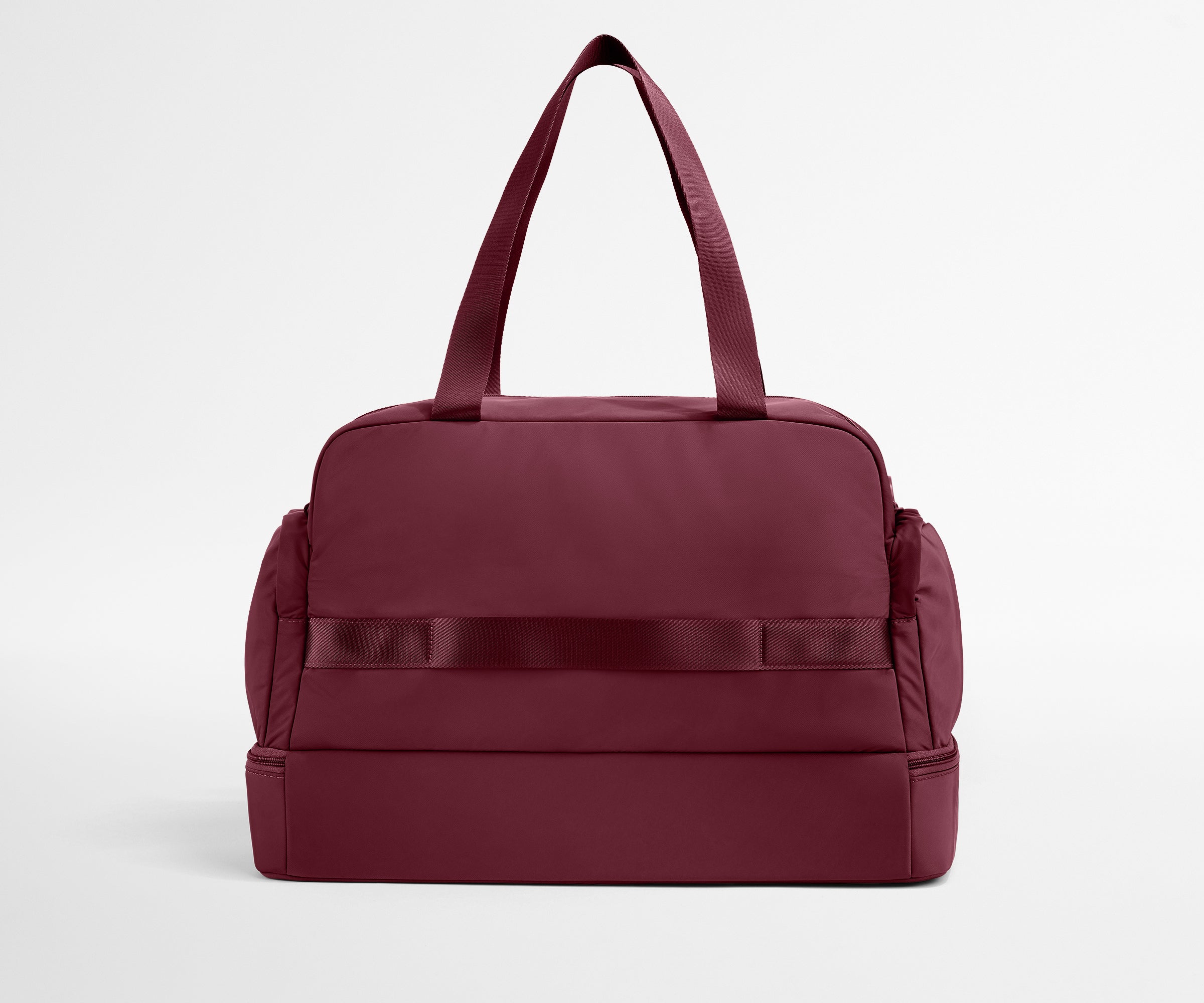 Maroon duffel bag on a light gray background