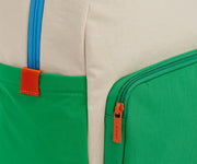 A close up shot of the Kids Backpack in Marshmallow White to show the colorblocked details and machine-washable material